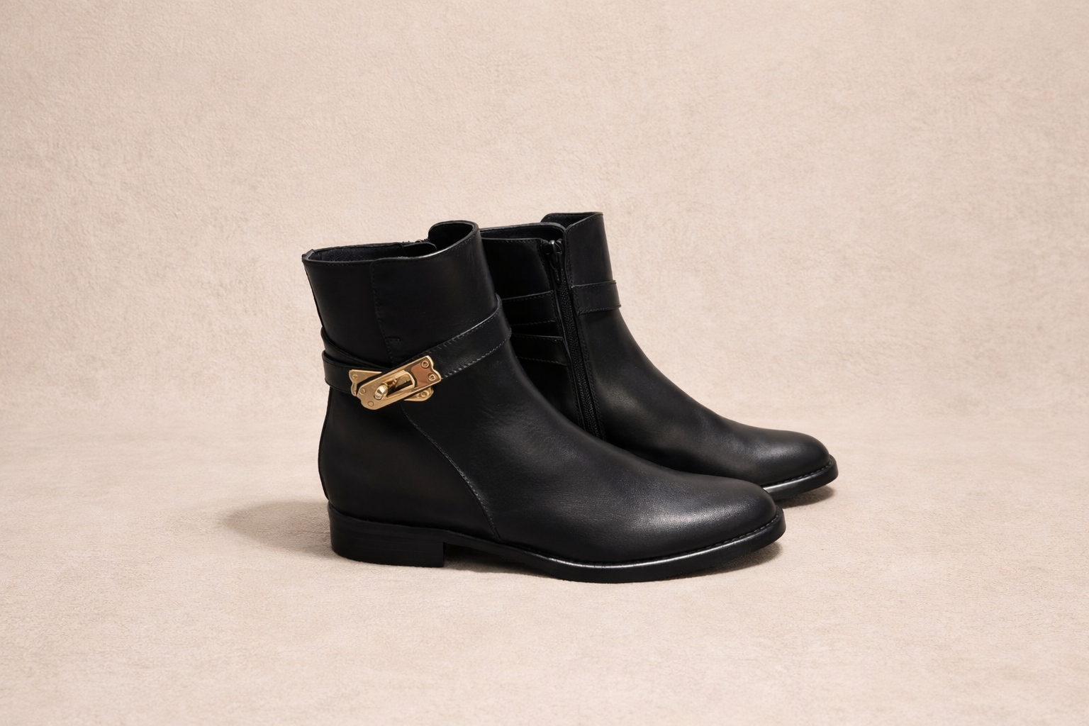 Black leather lock ankle boots