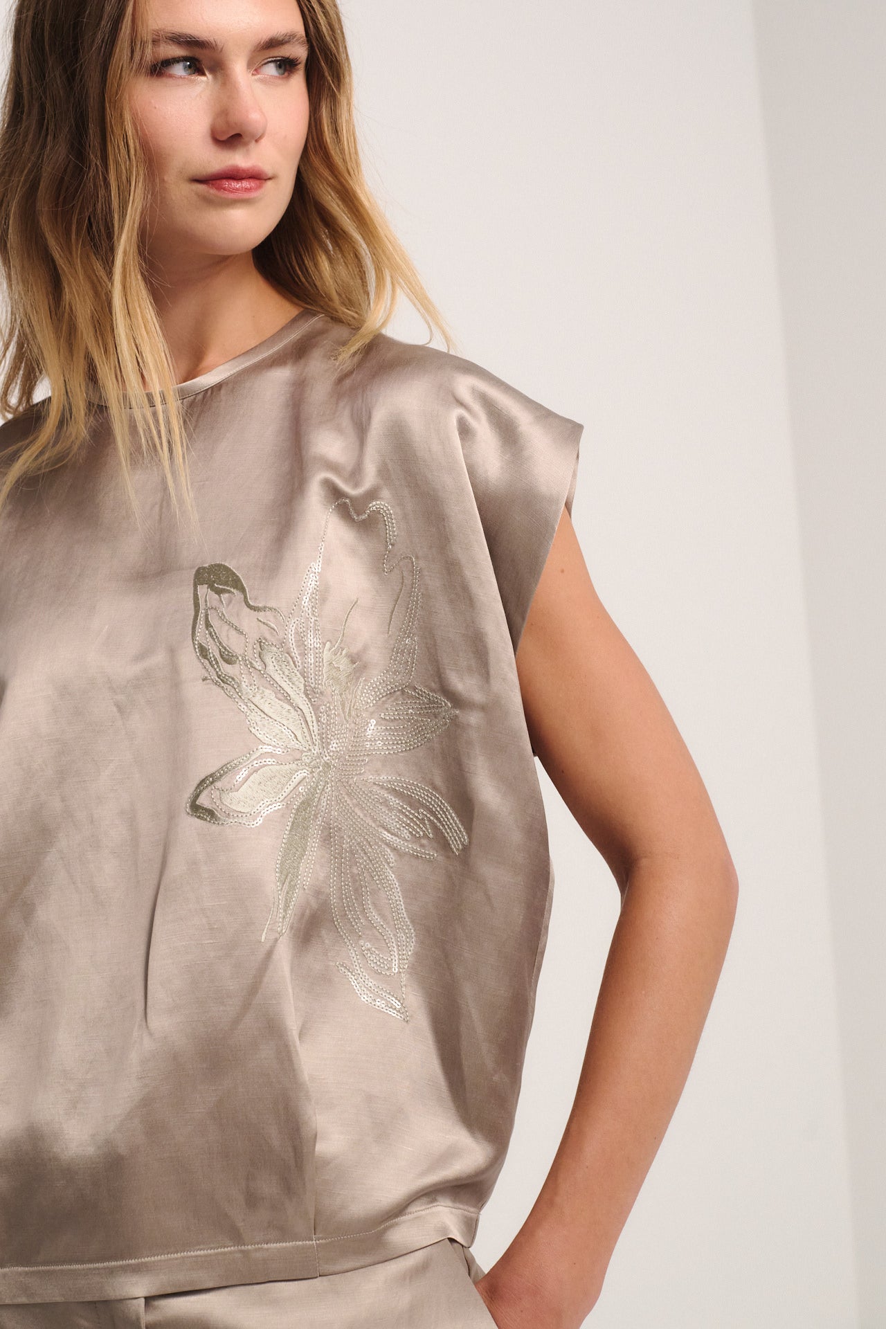 Champagne Satin Top with Sequin Floral Embroidery – Elegant Sleeveless Luxury Blouse