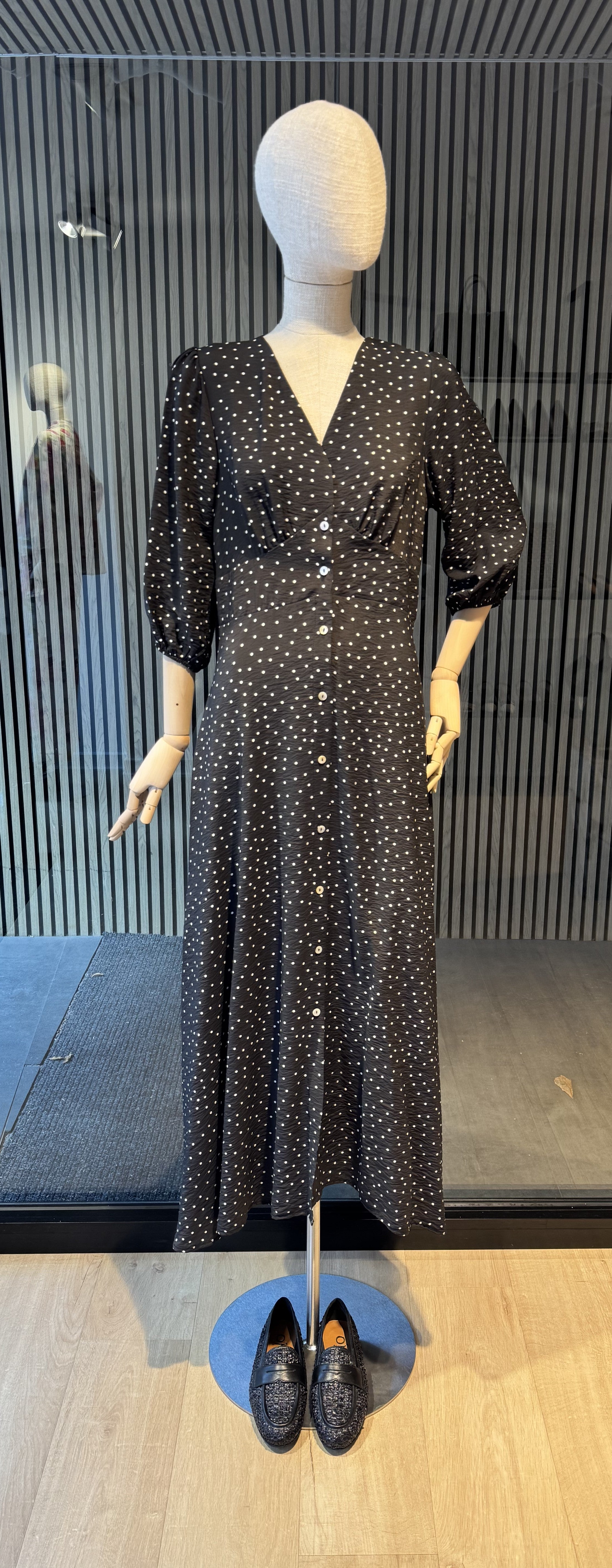 Black polka dot dress