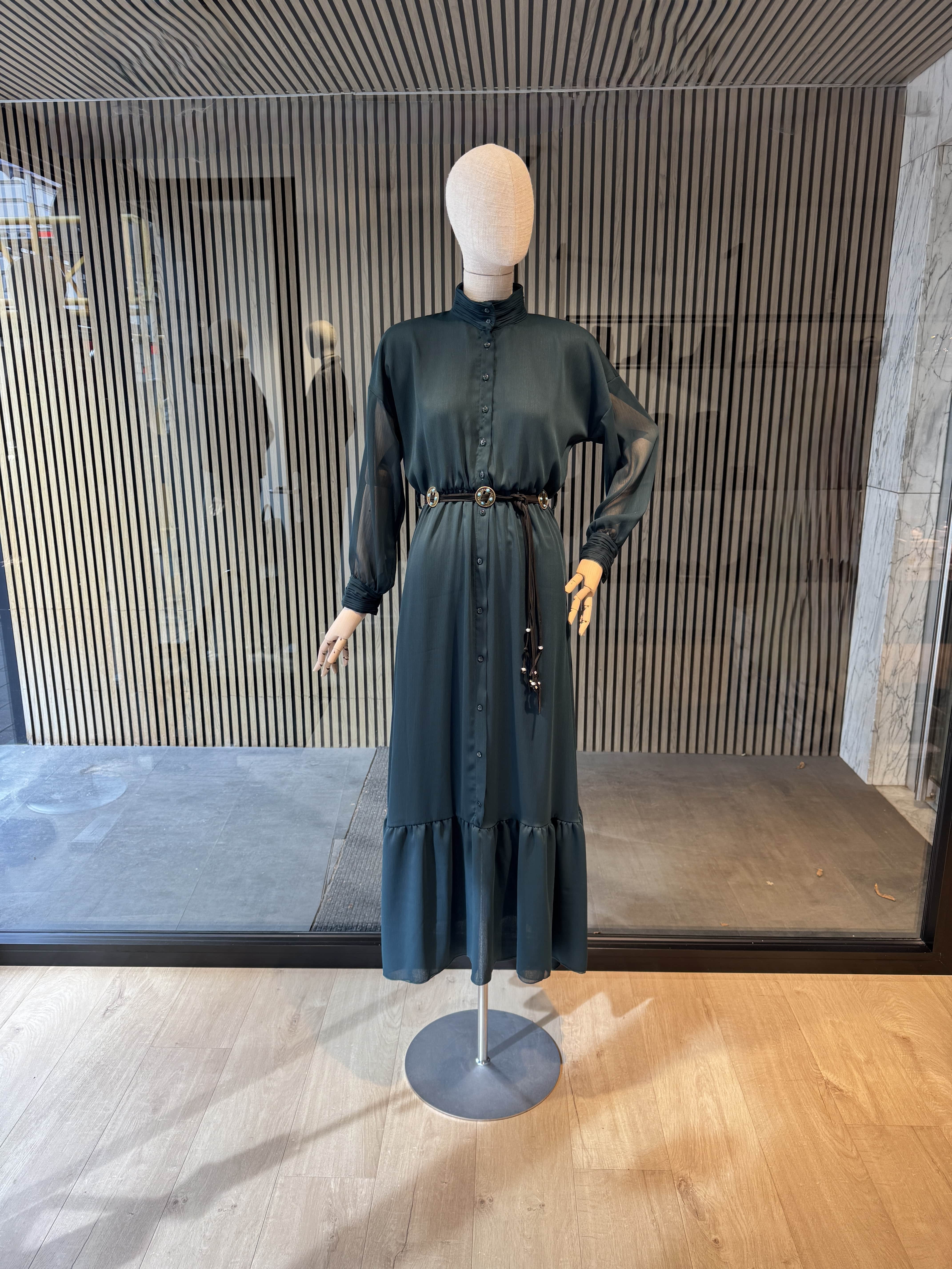 Long dark green dress with a belt
