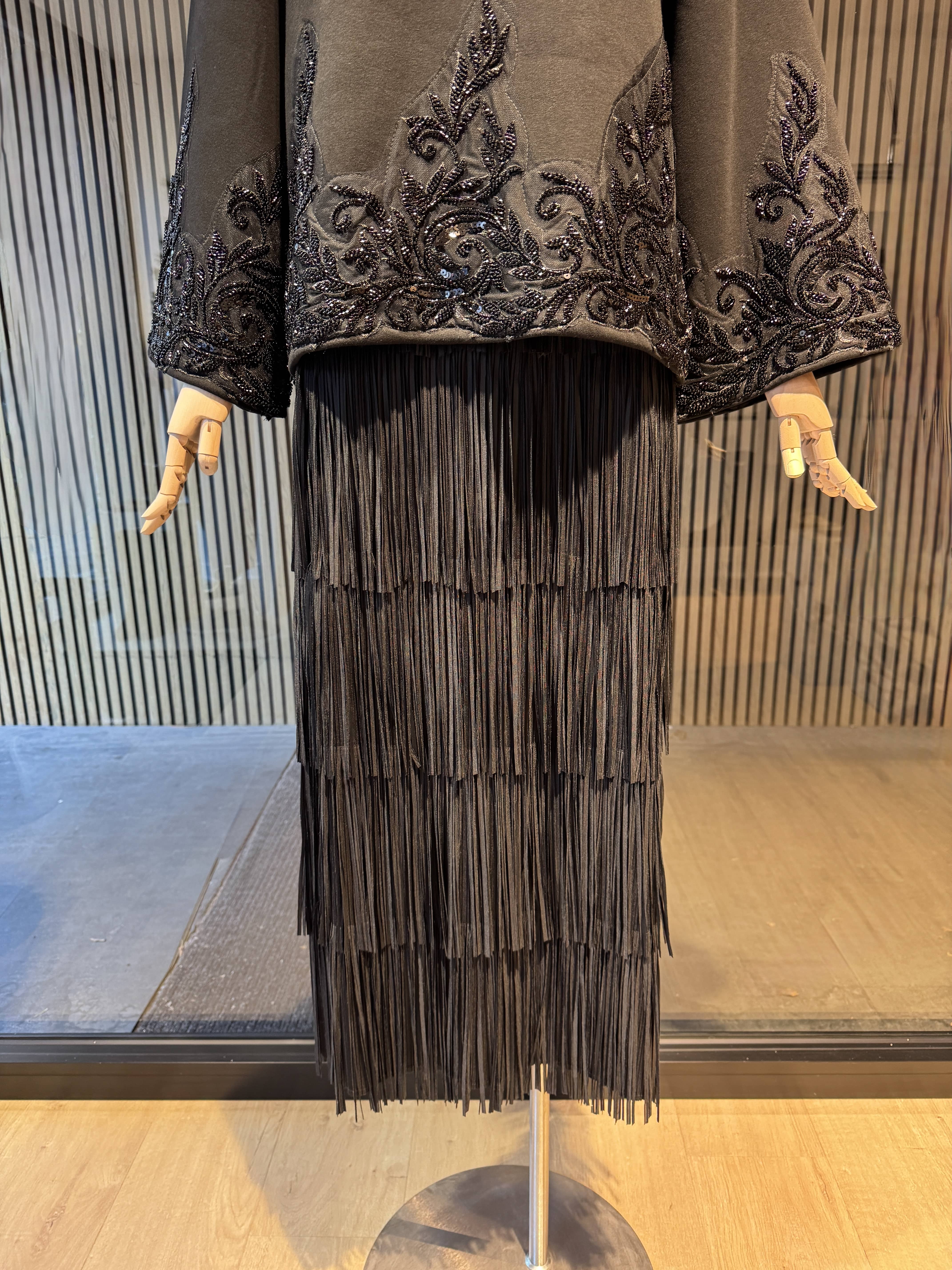 Long black skirt with fringes
