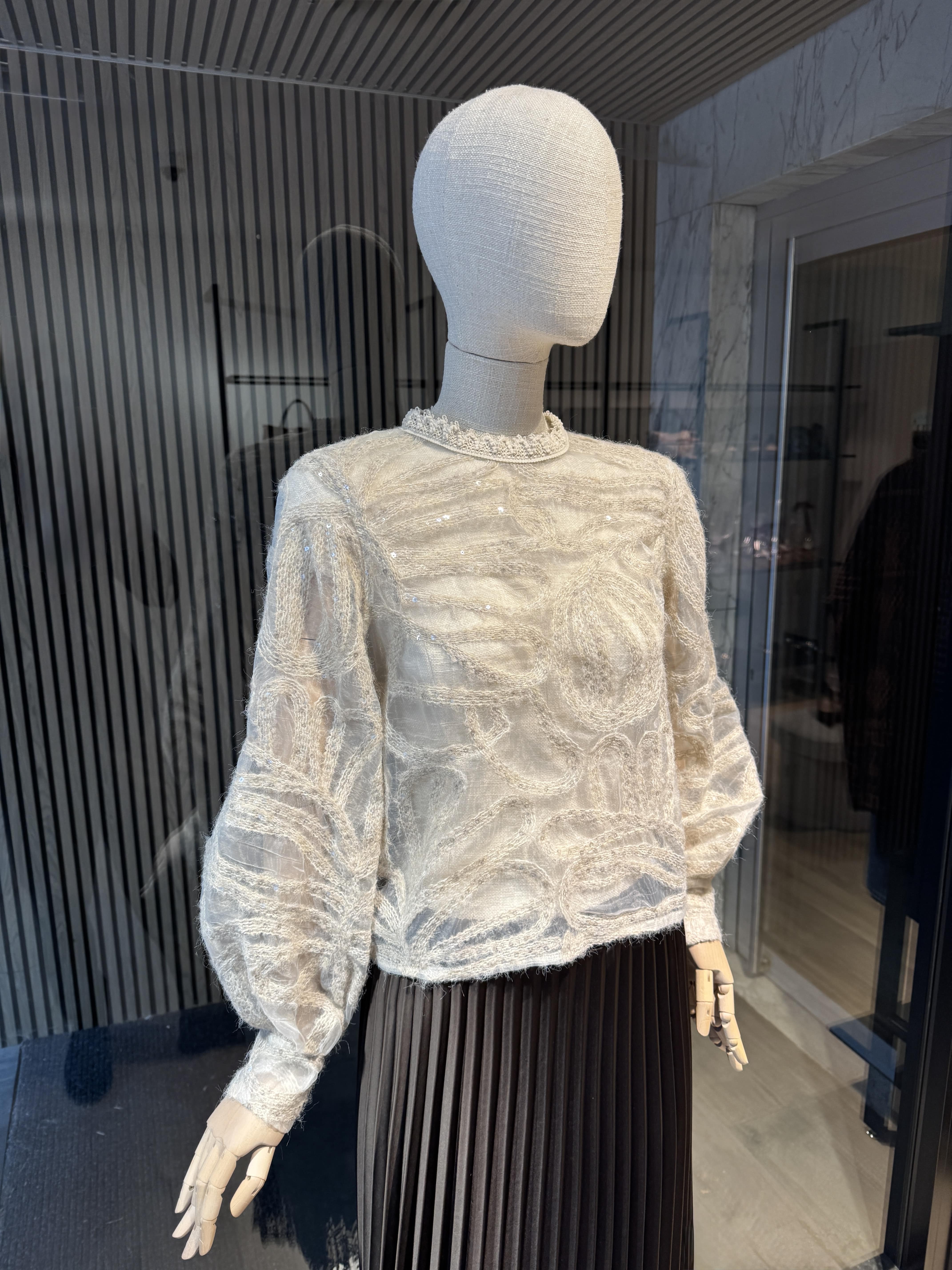 Beige blouse with sequins