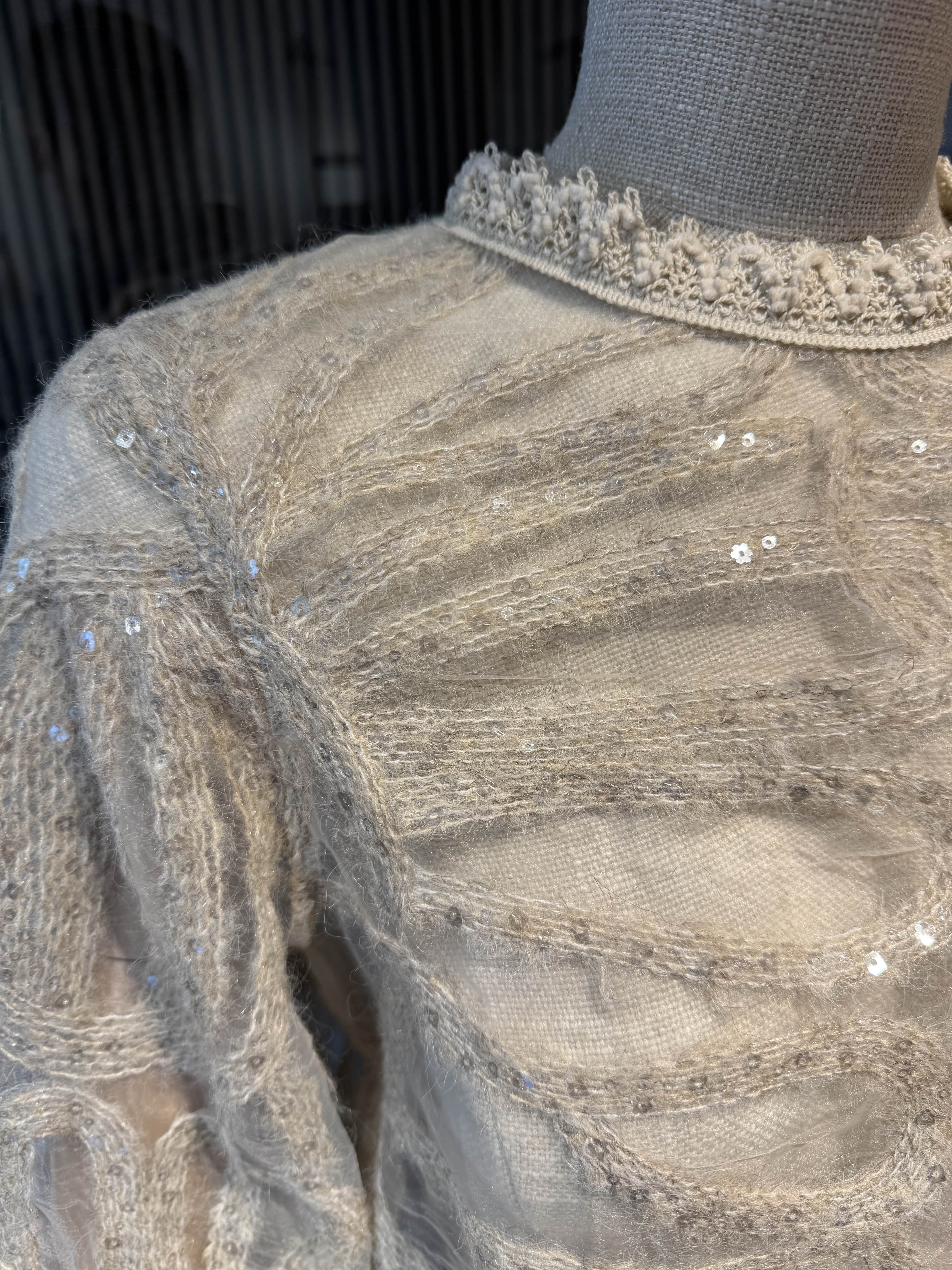 Beige blouse with sequins