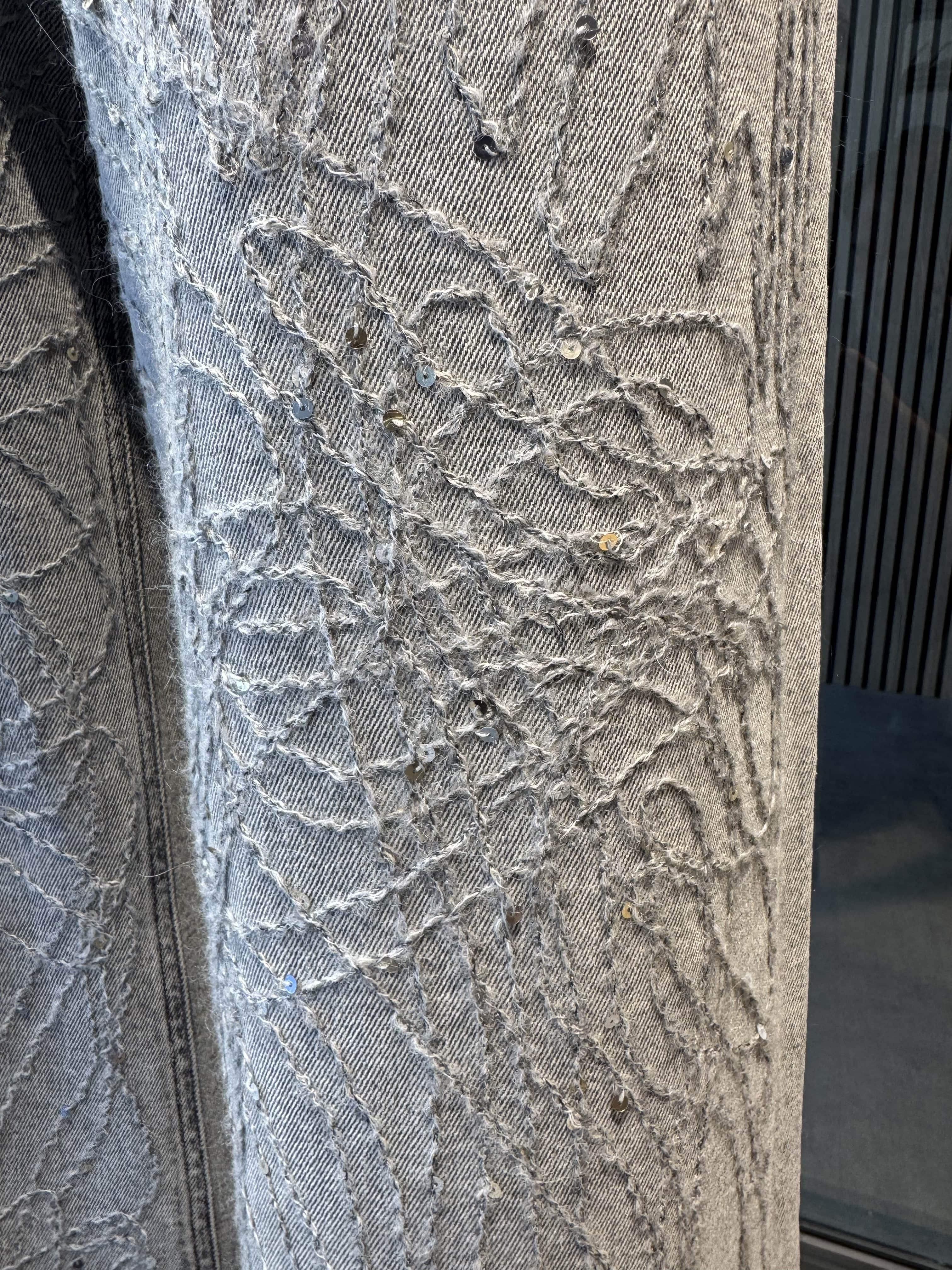 Flare jeans with front embroidery