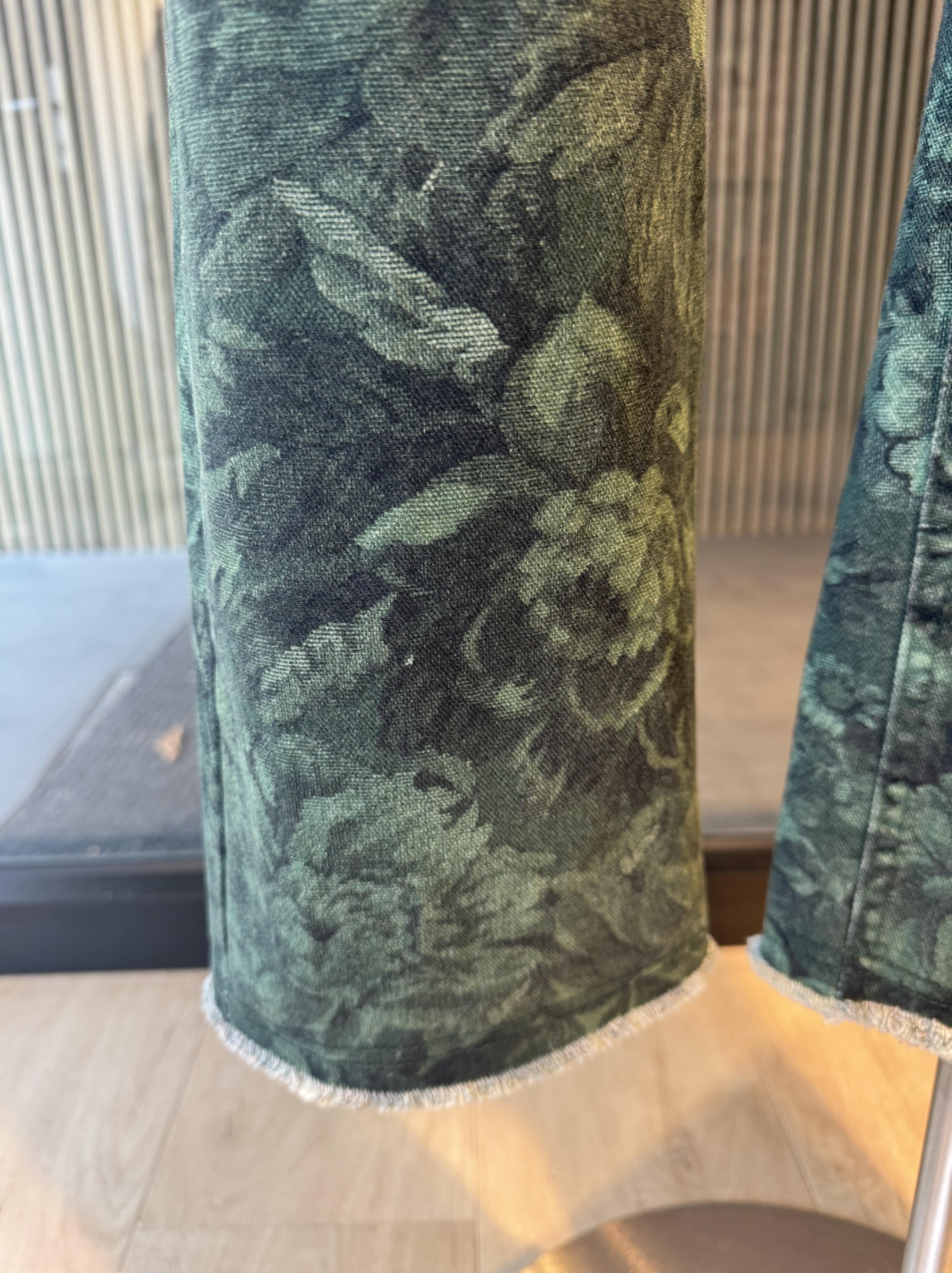 Green jeans with ornament