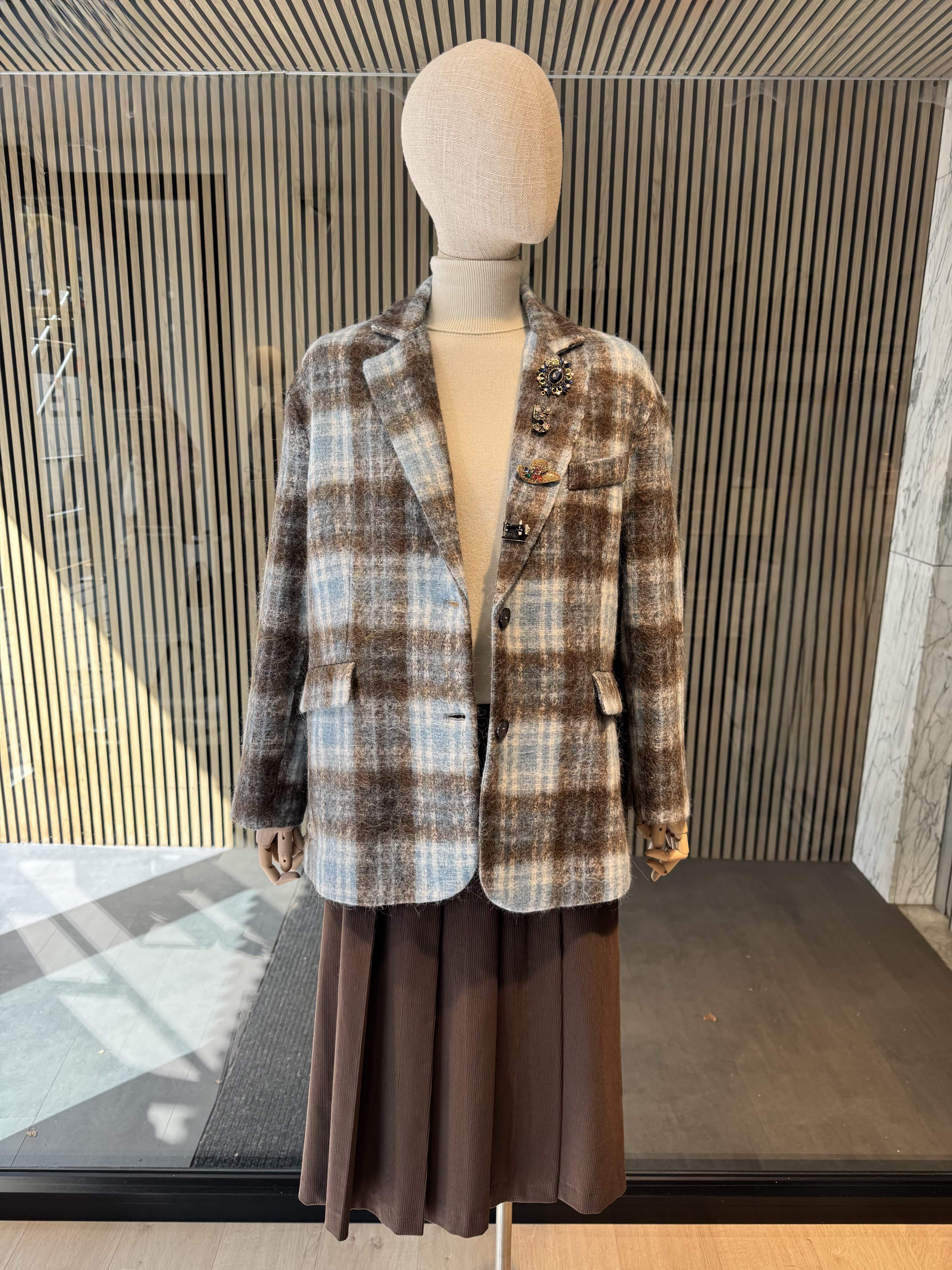 Pinstripe jacket with accessories on lapel