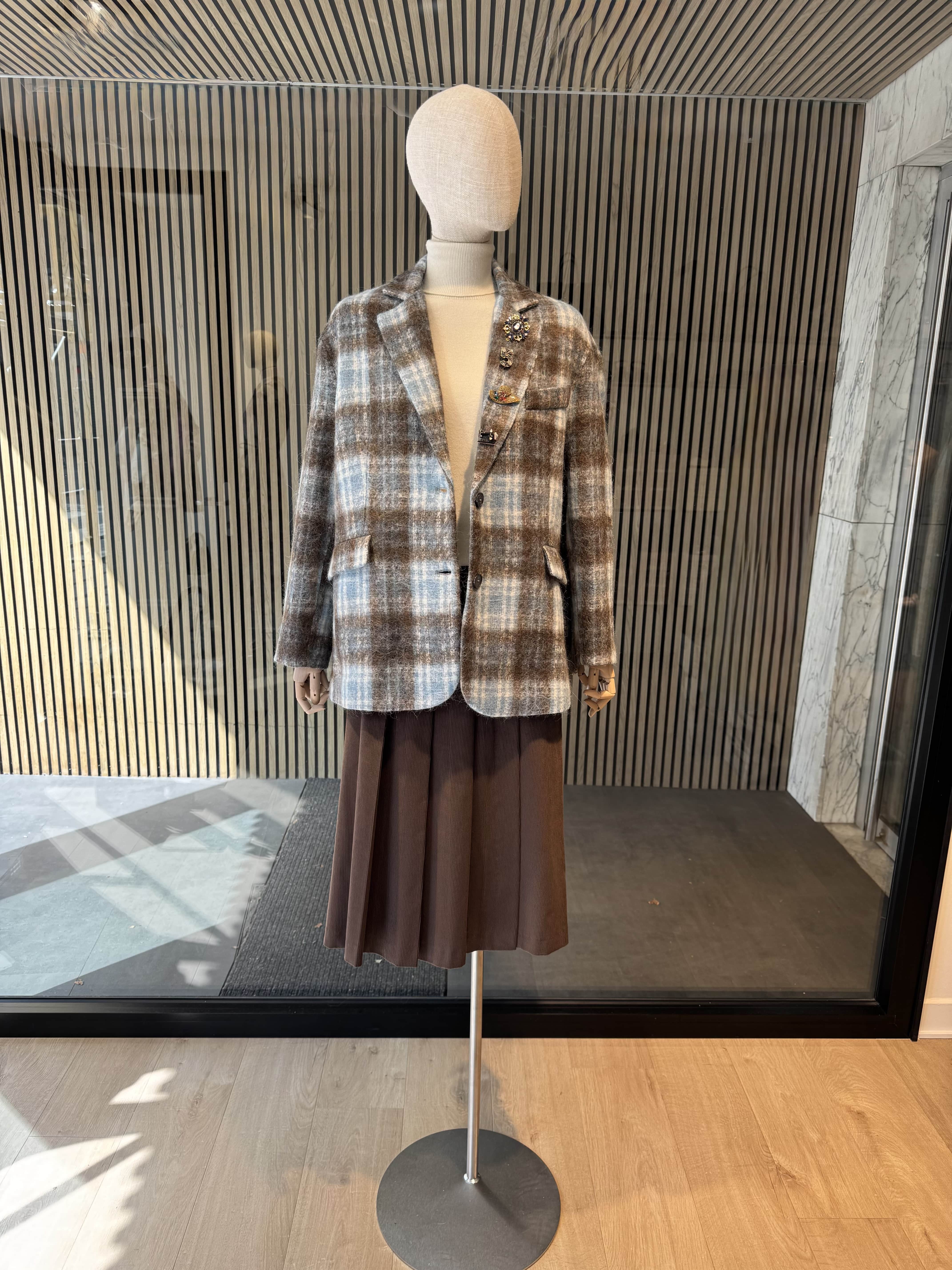 Pinstripe jacket with accessories on lapel