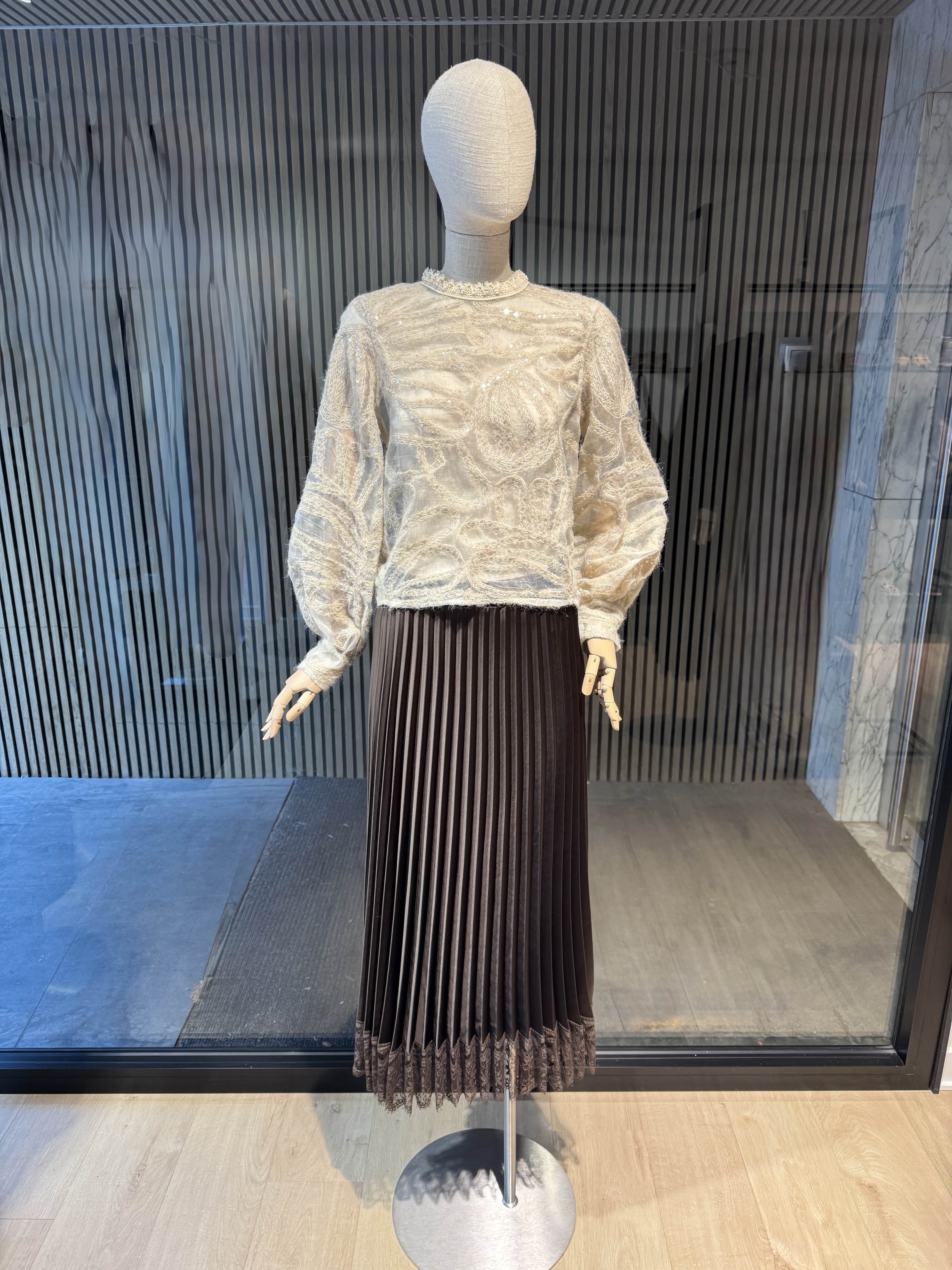 Beige blouse with sequins