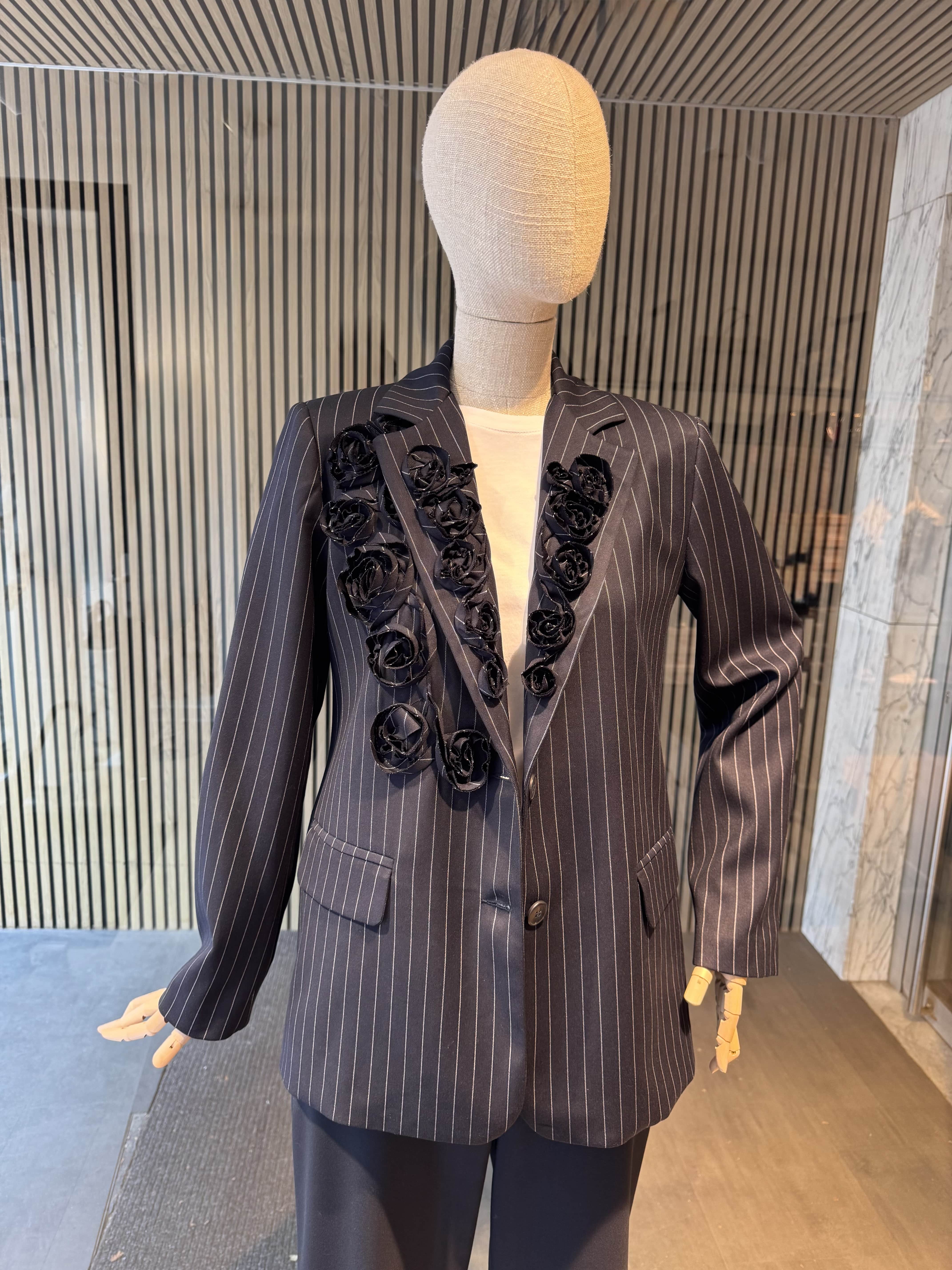 Pinstripe jacket with flower embroidered lapel