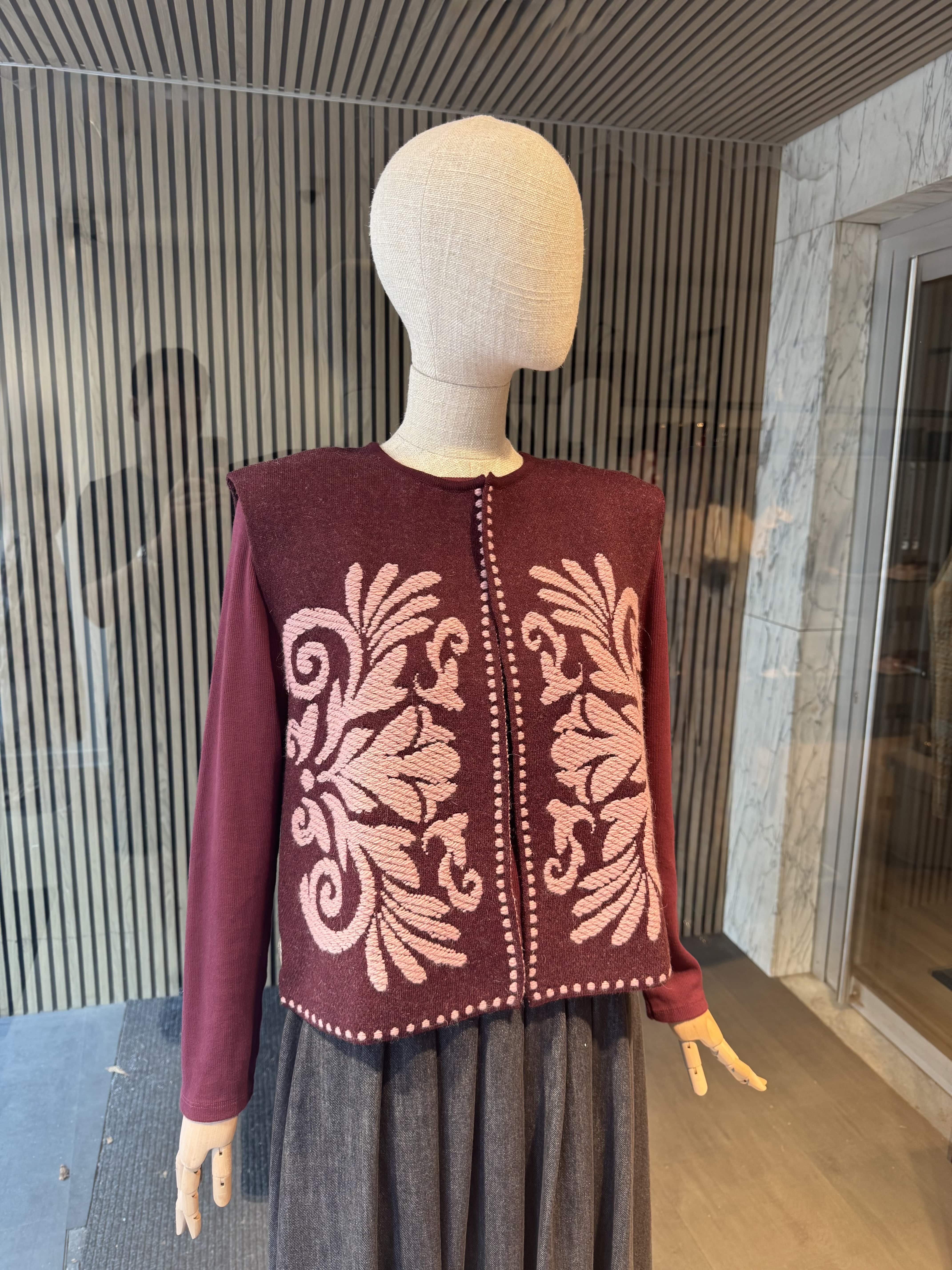 Vest with ornament