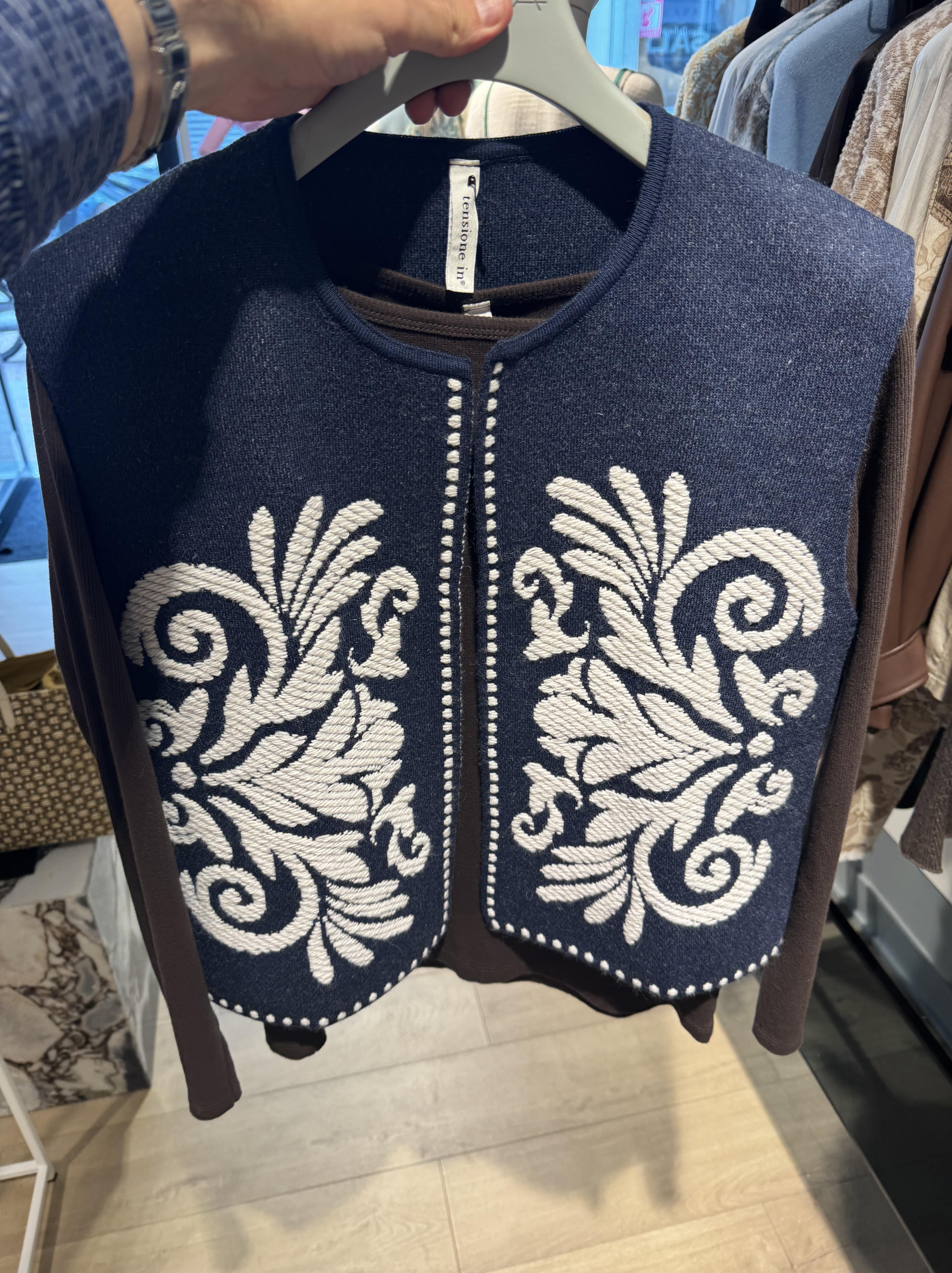 Vest with ornament