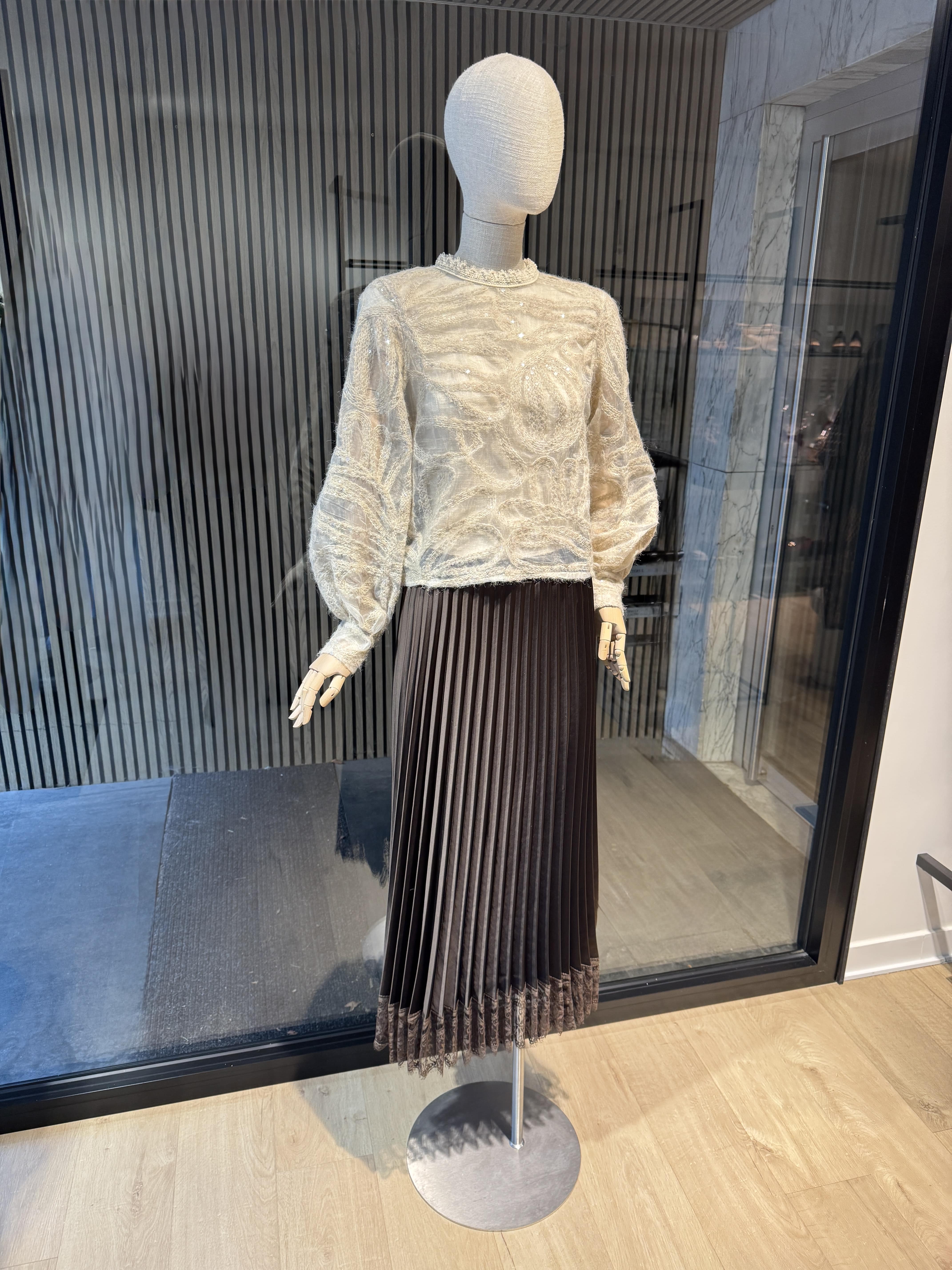 Beige blouse with sequins