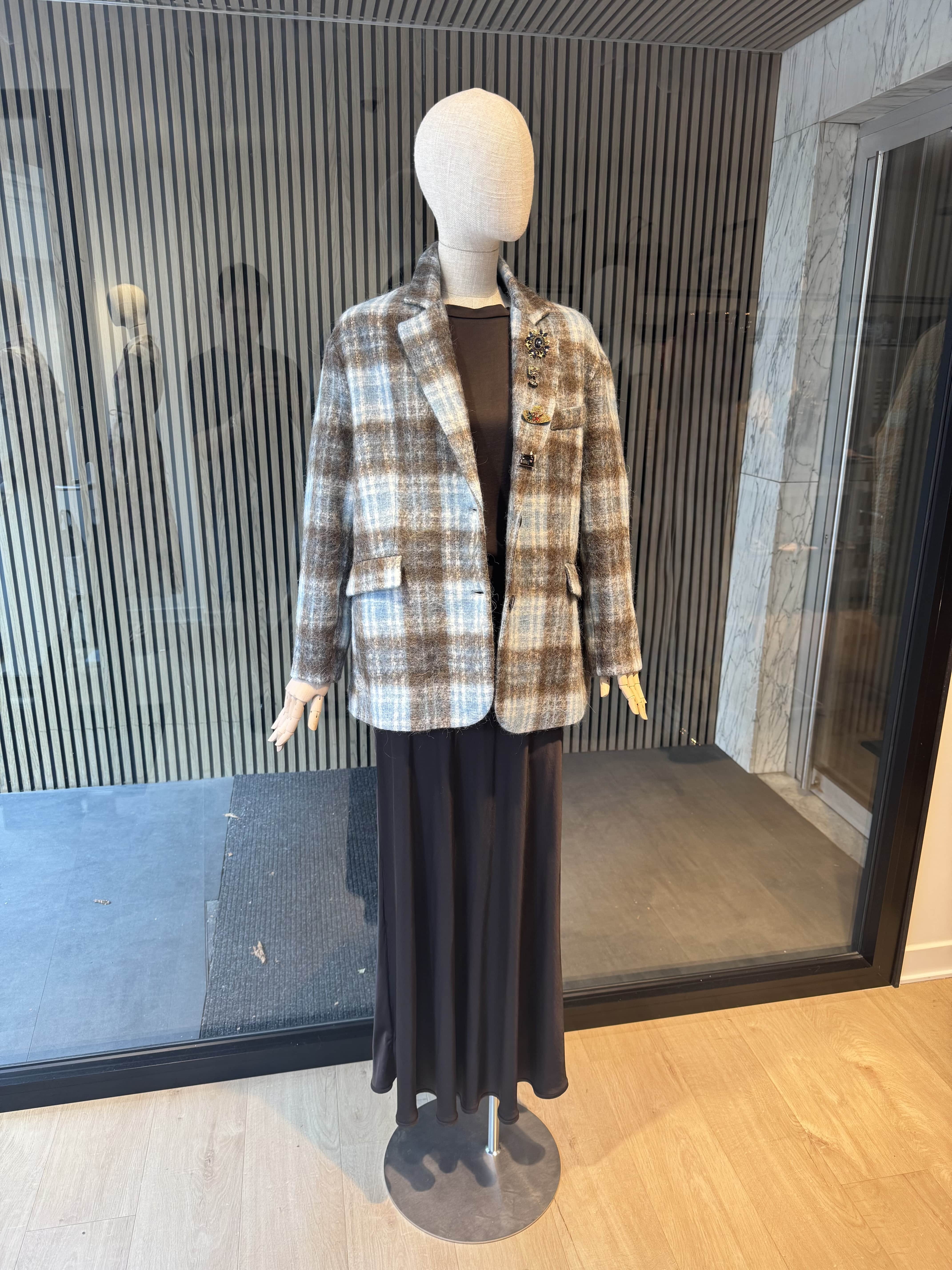 Pinstripe jacket with accessories on lapel