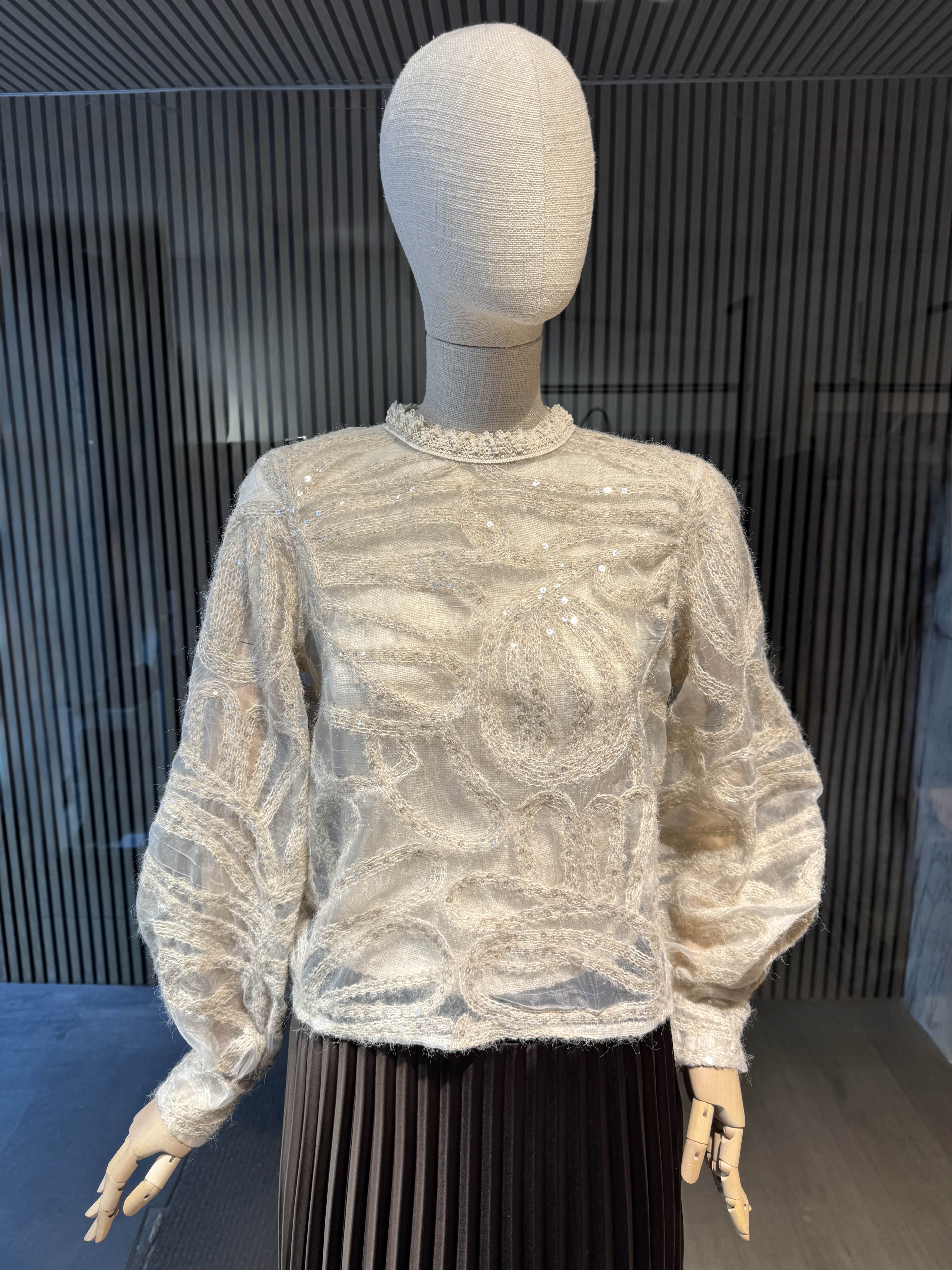 Beige blouse with sequins