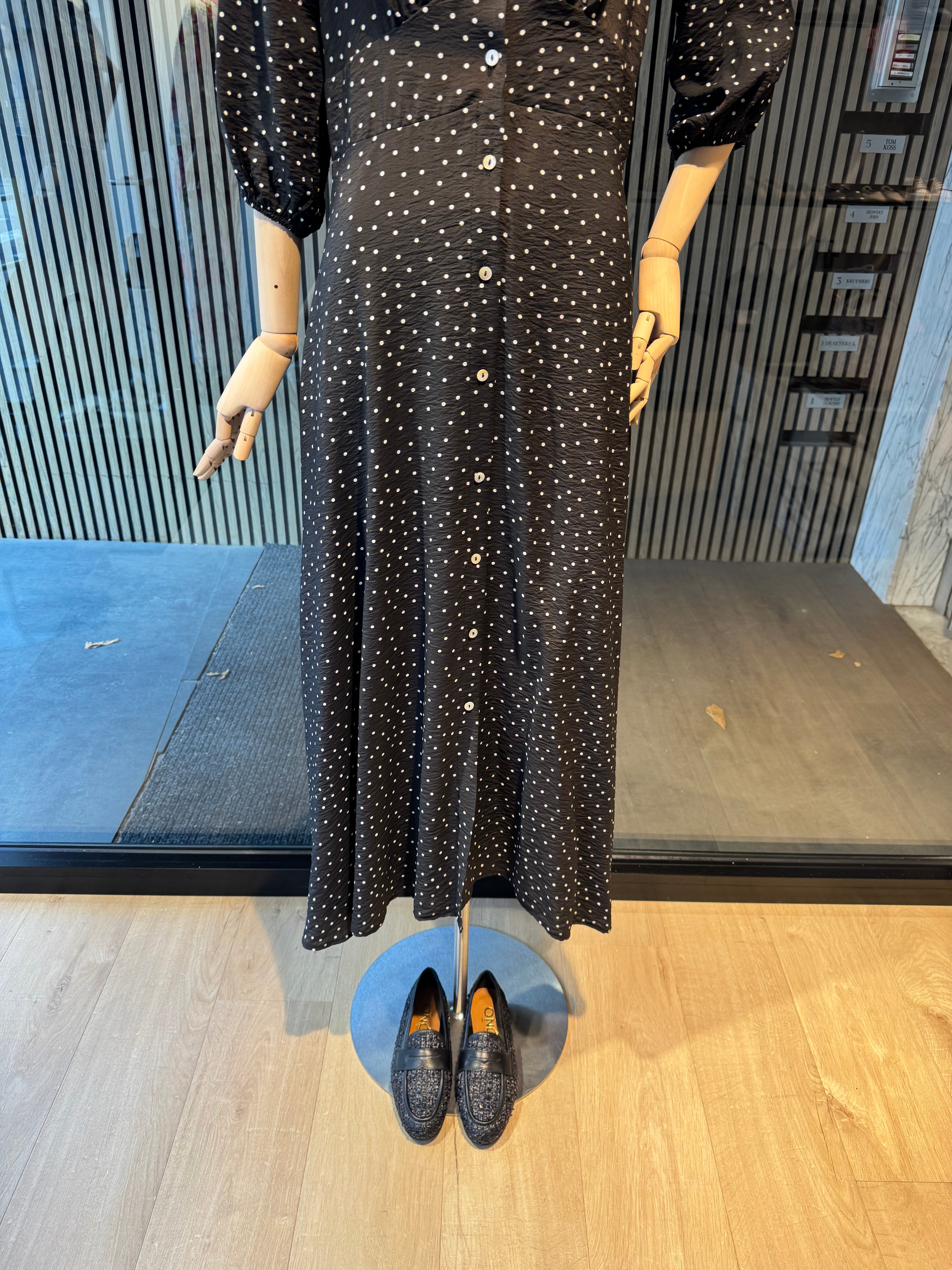 Black polka dot dress