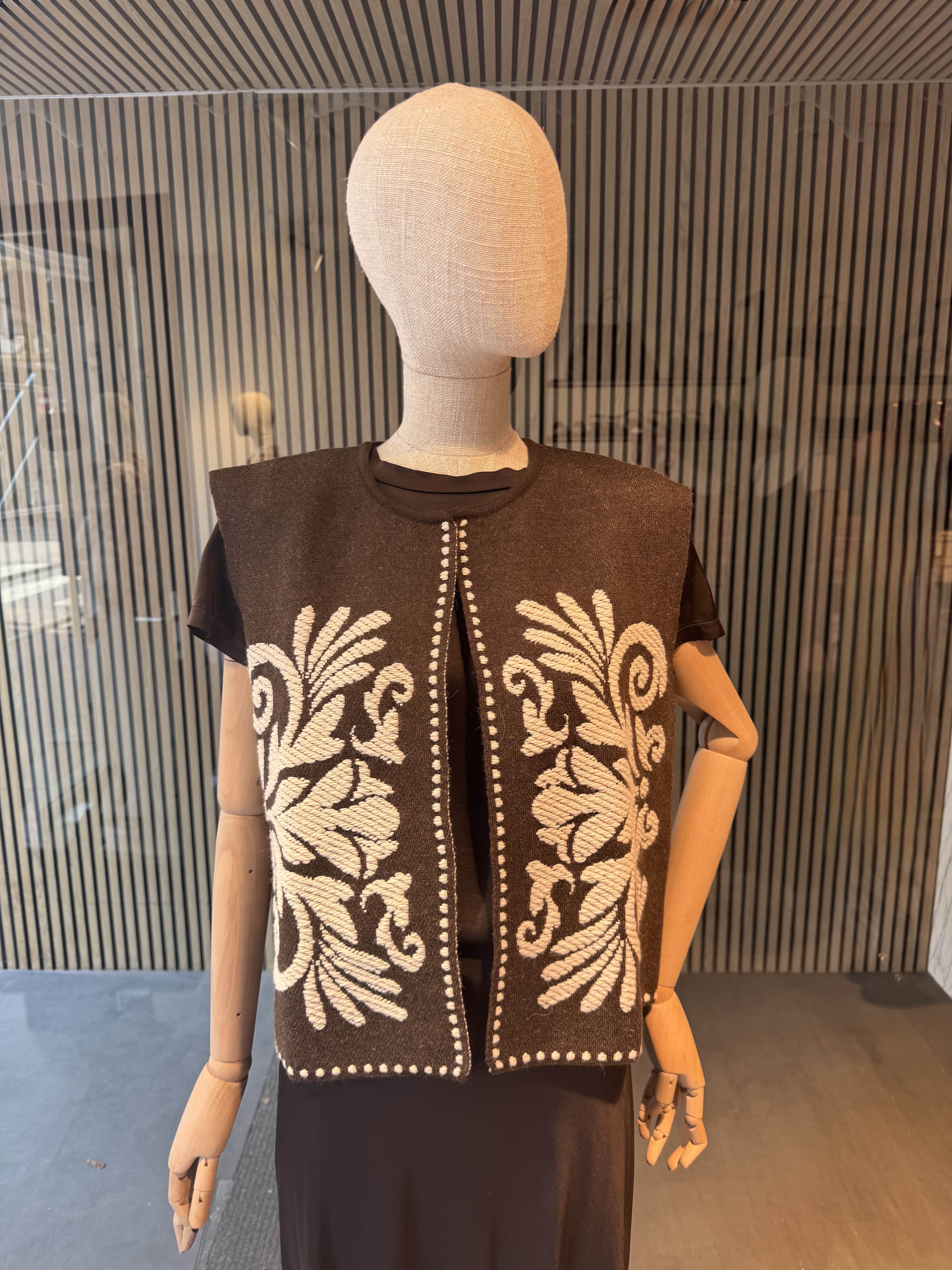 Vest with ornament