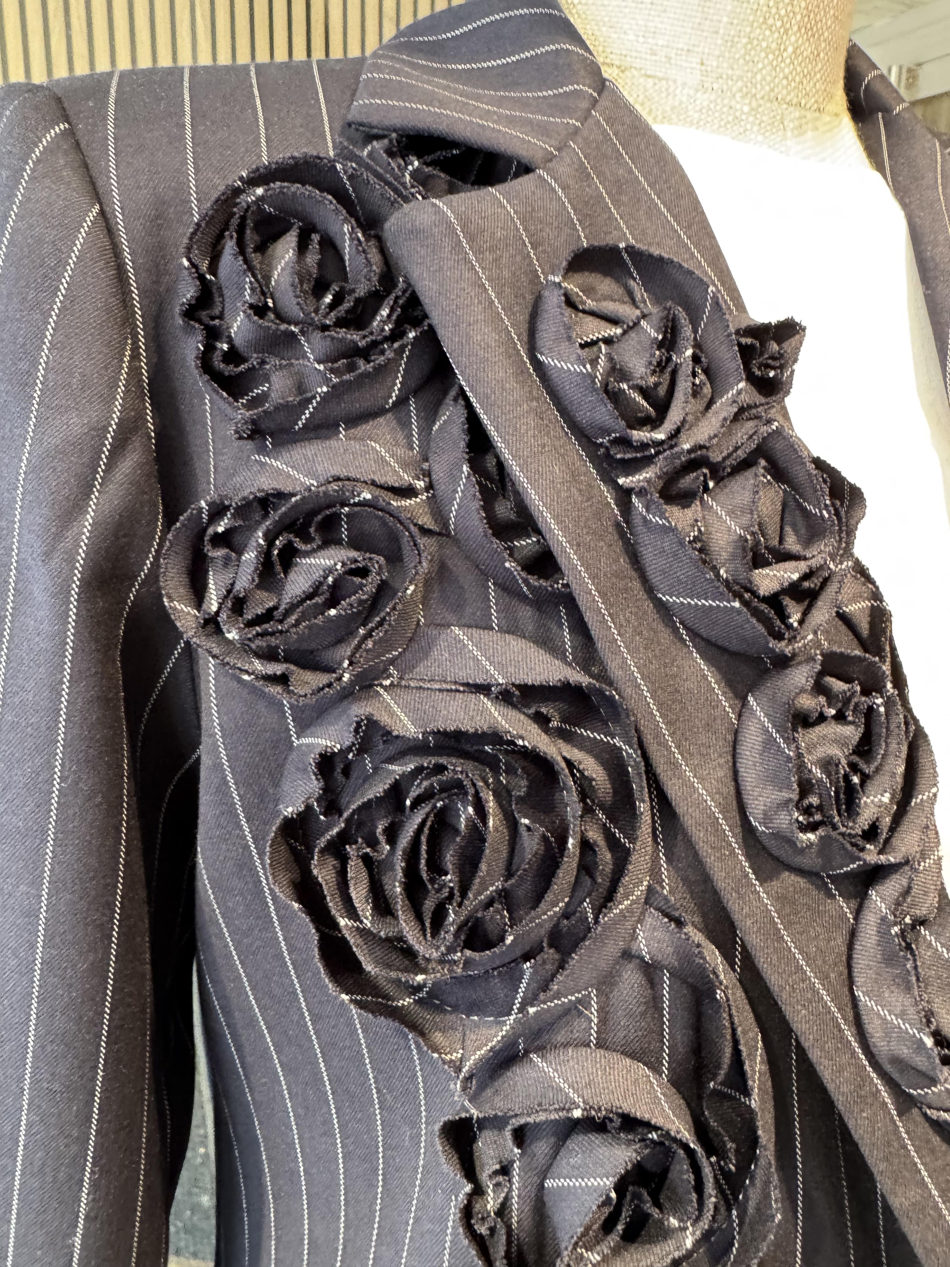 Pinstripe jacket with flower embroidered lapel