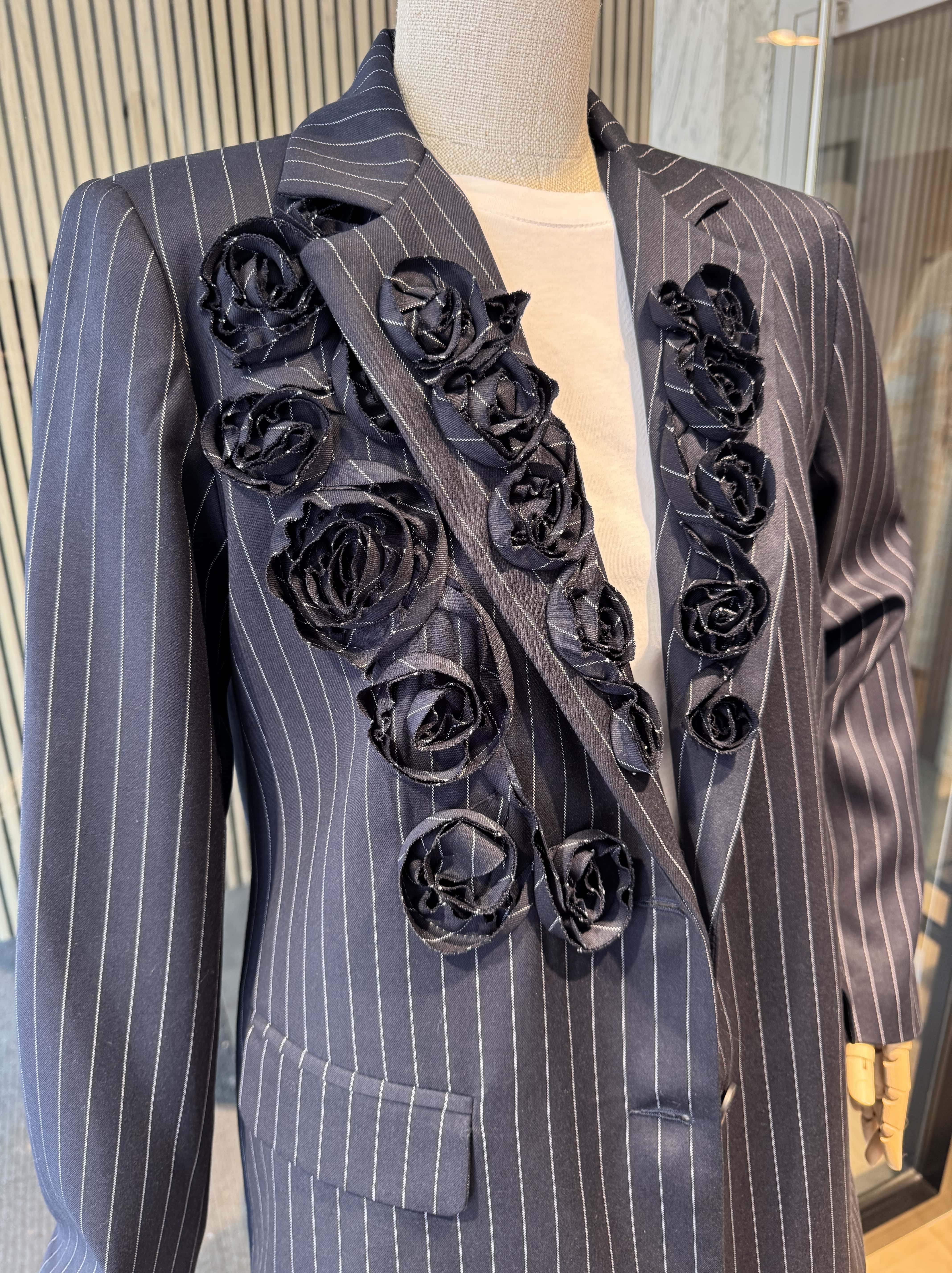 Pinstripe jacket with flower embroidered lapel