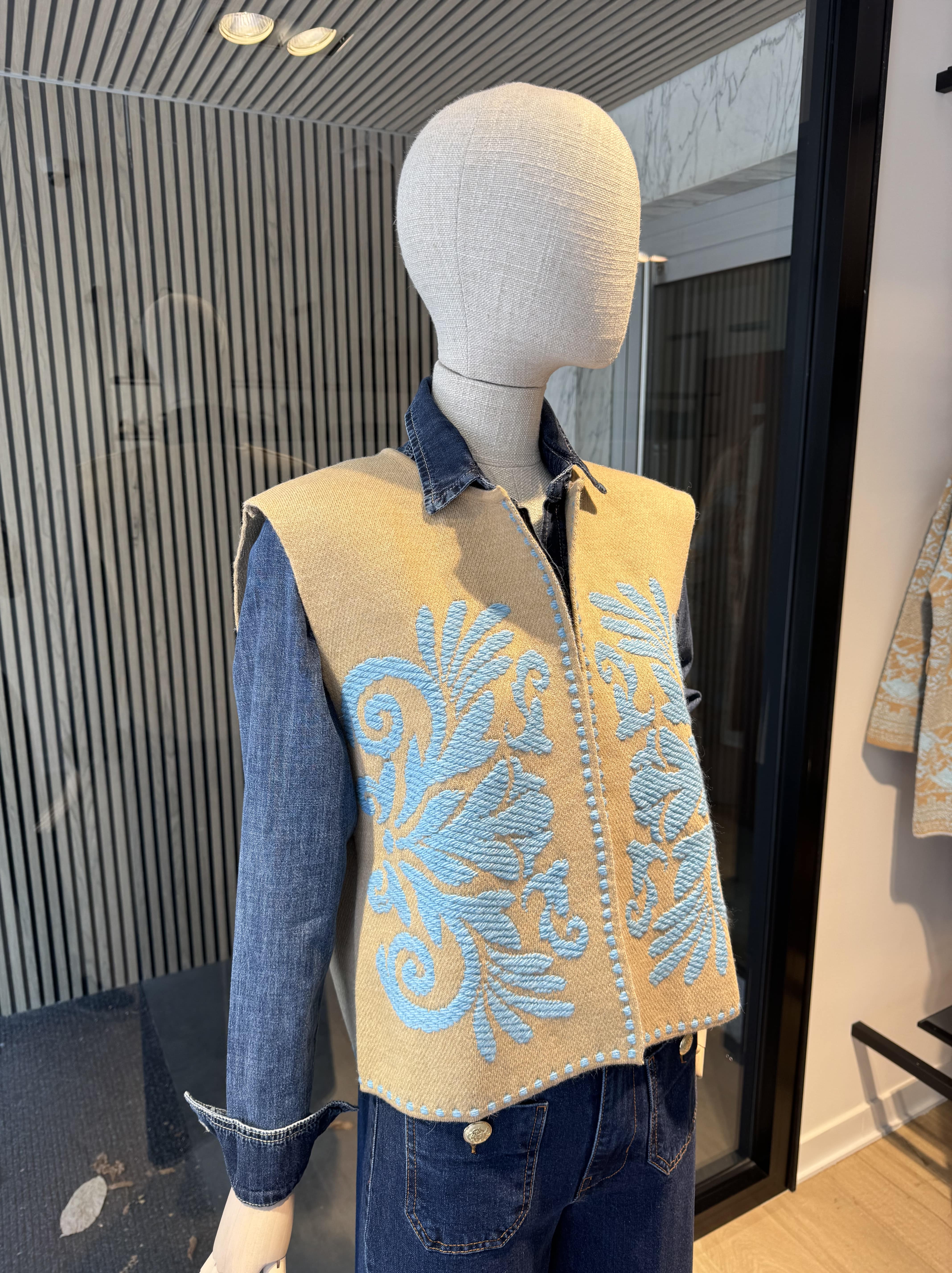 Vest with ornament