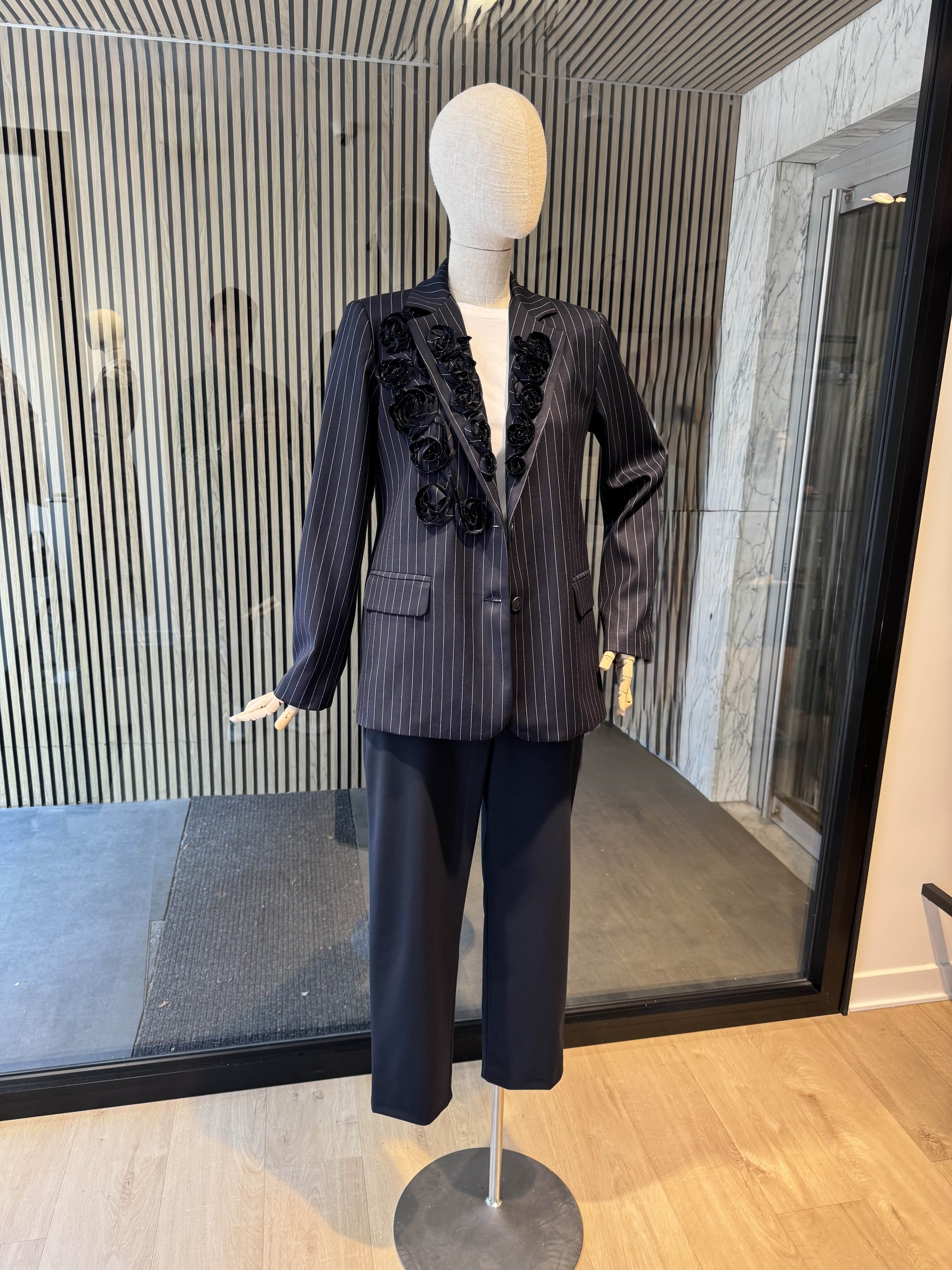Pinstripe jacket with flower embroidered lapel