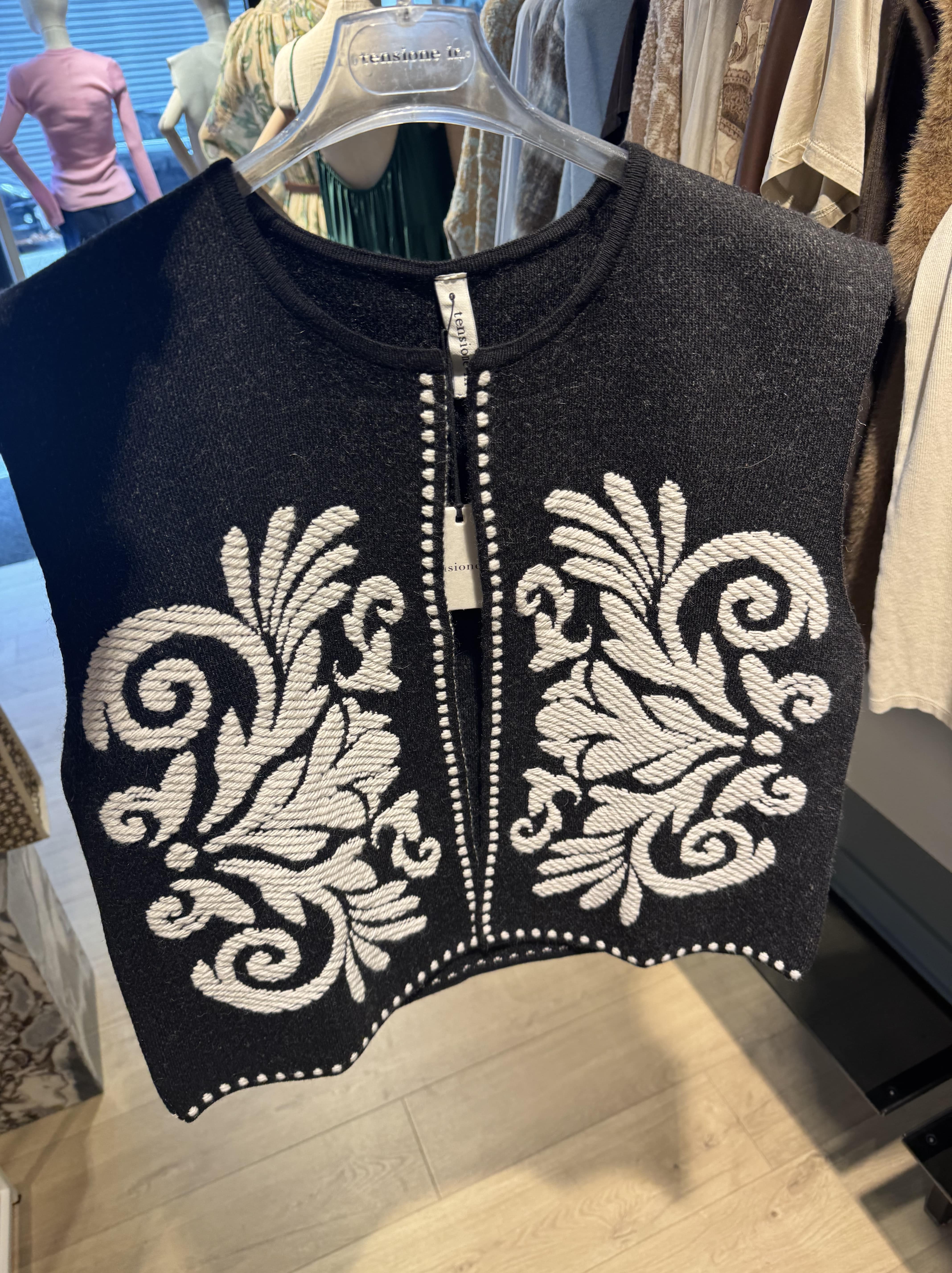Vest with ornament
